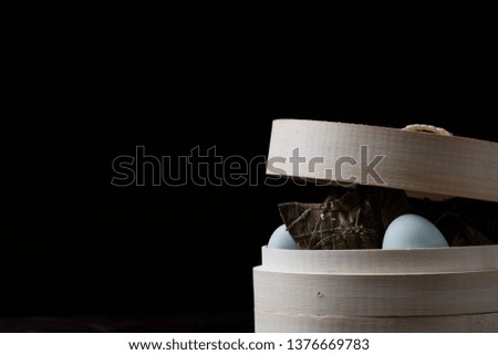 a cage of hazelnuts and duck eggs ready to cook