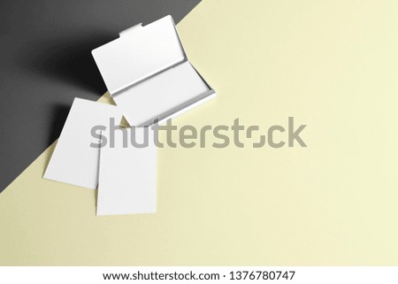 Blank business card on colorful background, business concept.