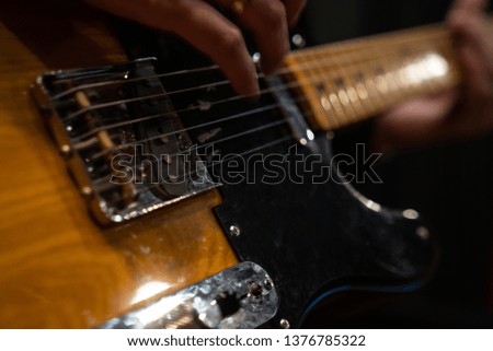 recording music audio for guitarist in studio Royalty-Free Stock Photo #1376785322