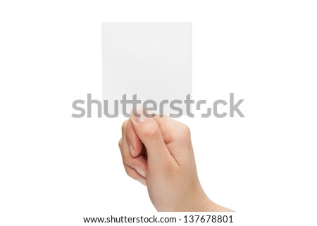 Female hand with a blank card isolated on white