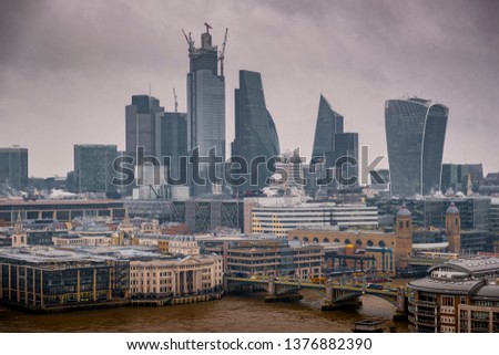 Photograph of London City on a hazy day.