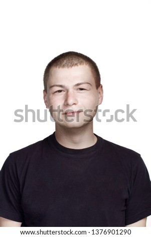 Funny face. Portrait of young man. Facial expression. 
