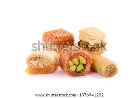  Middle eastern, Turkish sweet pastry baklava isolated on white background Royalty-Free Stock Photo #1376941292