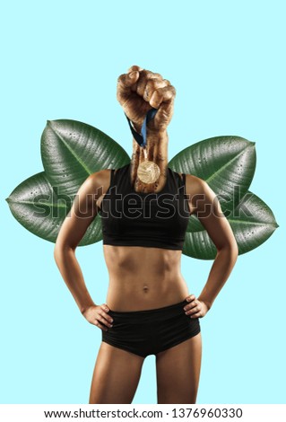 Thinking about the winning. Attractive sportive female body headed by fist with a medal on the leaves and blue background. Negative space to insert your text. Modern design. Contemporary art collage.