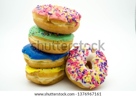 ssorted rising stack of delicious donuts