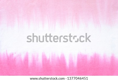 Tie dye fabric texture background. Trendy pattern close up Royalty-Free Stock Photo #1377046451