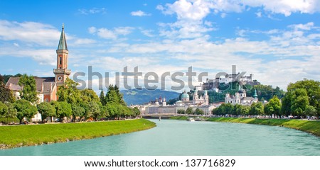 Panoramic view of Salzburg skyline with Festung Hohensalzburg and river Salzach, Salzburger Land, Austria Royalty-Free Stock Photo #137716829