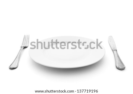 knife and fork with plate Royalty-Free Stock Photo #137719196