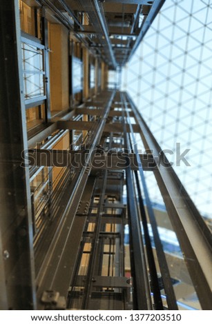 Lift mechanism. Glass Modern architecture