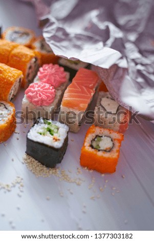                            
set food delivery sushi rolls on the table. japanese food fast food    