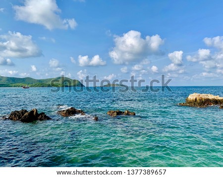 Picture of rocks in the sea and cloud