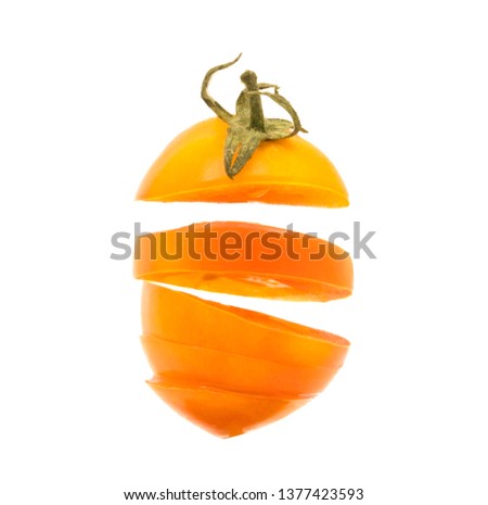 Orange small tomato on white background