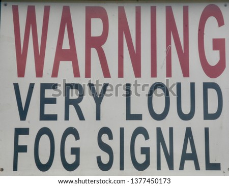 Sign at the lighthouse warning of a very loud fog signal 