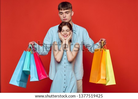  young couple shopping logo packages                             