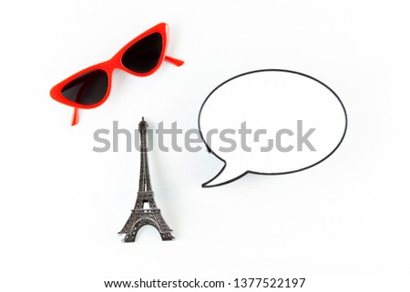 Decorative eiffel tower with light box in form of speech bubble with the space for the text message. French vacations, travel to Paris concept