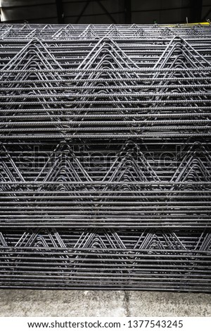 pile of steel fence material 