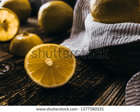 Fresh lemon over rustic wooden background 