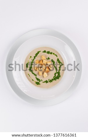 Fresh soup served in a white plate– stock image