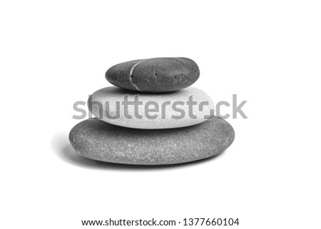 Sea pebble. Group of smooth grey and black stones. Pebbles isolated on white background