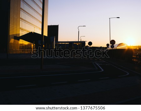 Reflections of modern commercial buildings on glasses with sunlight