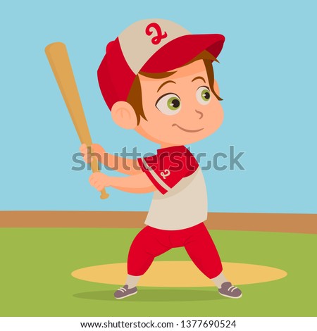 Boy playing baseball. Little boy in baseball uniform.
