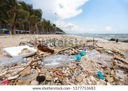 Pictures of dirty beach filled with plastic pollution, garbage and waste on sandy