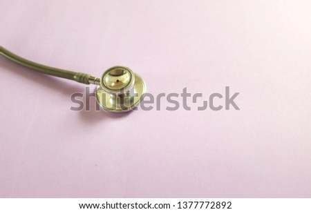 copy space and top view Stethoscope on Purple background. space for text