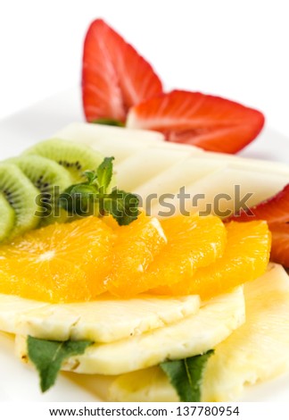  Fresh fruits with peppermint , isolated on a white background