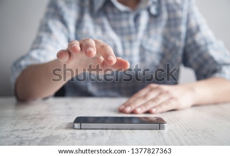 Business girl hand with smartphone. Technology