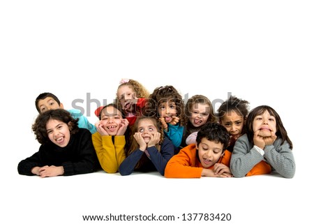 Group of children posing isolated in white
