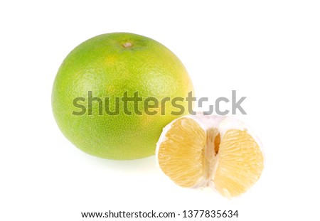 close up on green grapefruit isolated on white background