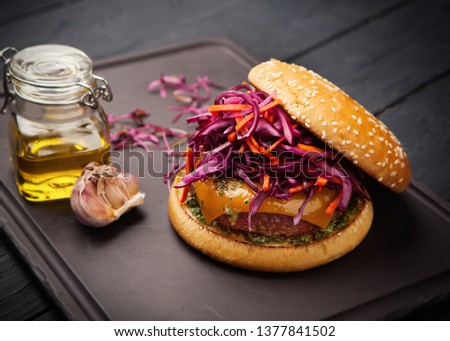 image of a burger with ham