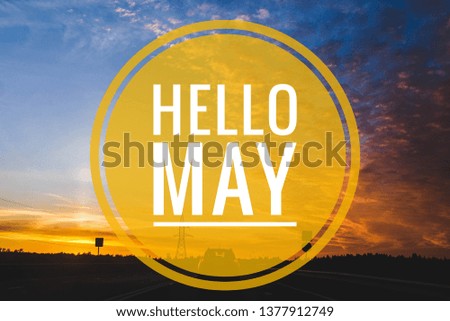 Banner Hello May. Greeting the new month. Hi spring. The text in the picture of the sunset. Evening sunset Sunset.