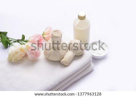 spa setting concept on pile of white stones
