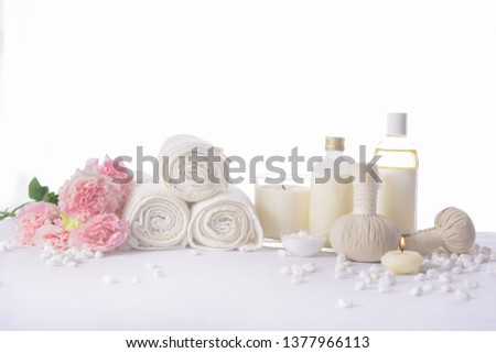 spa setting concept on pile of white stones
