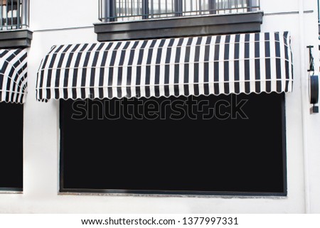 shop building mockup and template blank advertising signage with dark frame