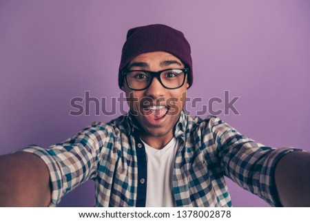 Closeup photo portrait of cheerful carefree crazy student millennial making taking picture isolated violet background