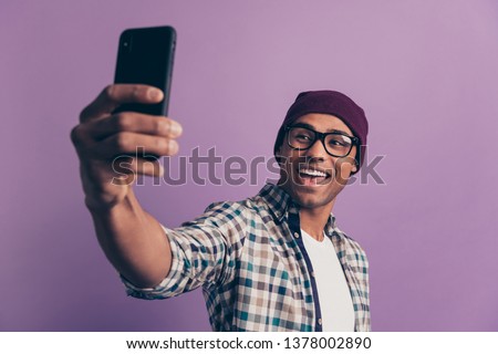 Closeup photo portrait of funny funky excited cheerful positive handsome nice with white toothy smile millennial making taking picture white traveling isolated violet background