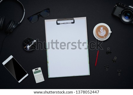 Office supplies with copy space on black background . Flat lay and top view business desk lifestyle concept.