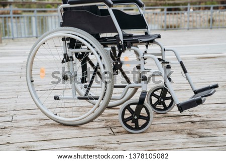 Wheelchair alone in the park