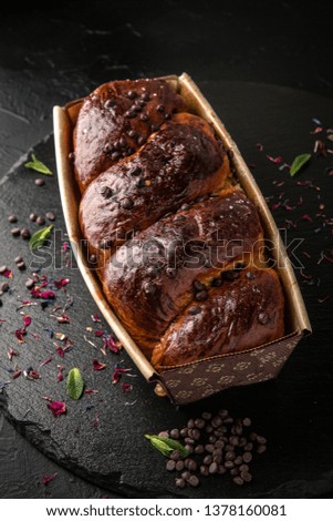 Easter cake with raisins, nuts, poppy seeds, chocolate. Holiday pastries.