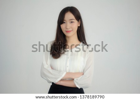 Portrait of thai adult working women white shirt relax and smile