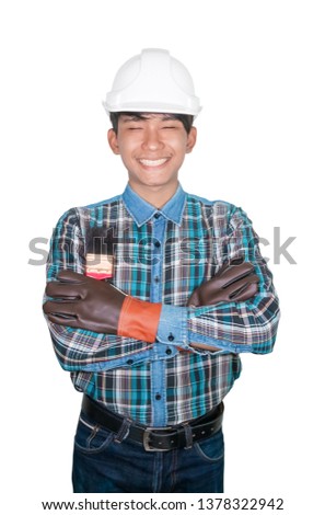 hand cross of engineer holding paint brush wear Striped shirt blue and glove leather with white safety helmet plastic On the head white background. construction concept