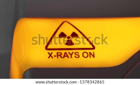 X-rays danger alert light on