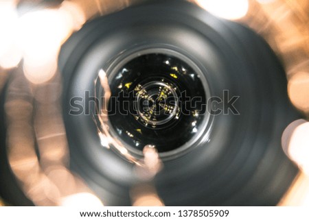 Close up of light reflections in a Camera Lens