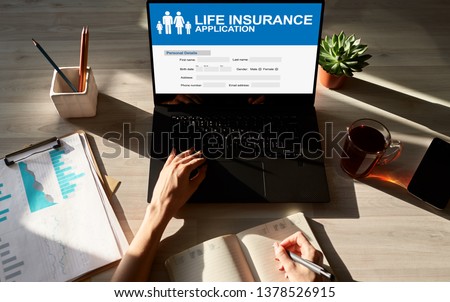 Life insurance online application form on device screen. Royalty-Free Stock Photo #1378526915
