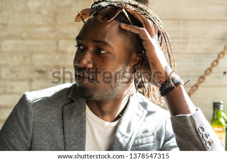 Handsome black guy portrait with sunglasses. African American person