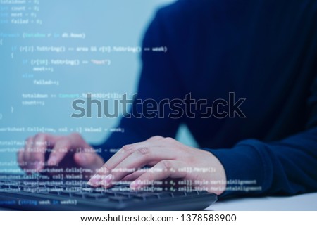 employee programmer man hand type on keyboard at computer desktop for input code language to software for fix bug and defect in operation office room for development of ai learning project technology 