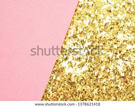Abstract geometric background pink textured paper and golden paper with a large glitter.

