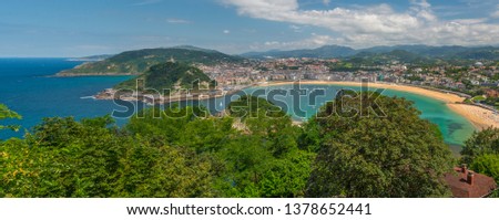 San Sebastián, Spain - July 26 2016: Sunny view over La Concha beach.